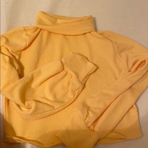 very cute cuffed sleeve yellow turtleneck